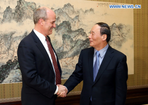 Chinese Vice Premier Wang Qishan (R) meets with a delegation of the U.S. House of Representatives led by Rick Larsen (L), co-chair of U.S.-China Working Group of the U.S. House of Representatives, in Beijing, capital of China, Jan. 29, 2013.(Xinhua/Yao Dawei)