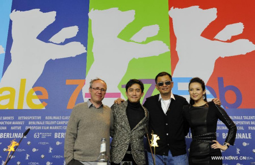 Director Wong Kar Wai(2nd R), actor Tony Leung (2nd L), actress Zhang Ziyi (1st L) and cinematographer Philippe Le Sourd attend the press conference to promote the film The Grandmaster at the 63rd Berlinale film festival in Berlin, Germany, Feb. 7, 2013. The 63rd Berlinale film festival opens Thursday with a martial arts epic The grandmaster of Chinese director Wong Kar Wai who will also lead the jury of this Berlinale. (Xinhua/Ma Ning) 