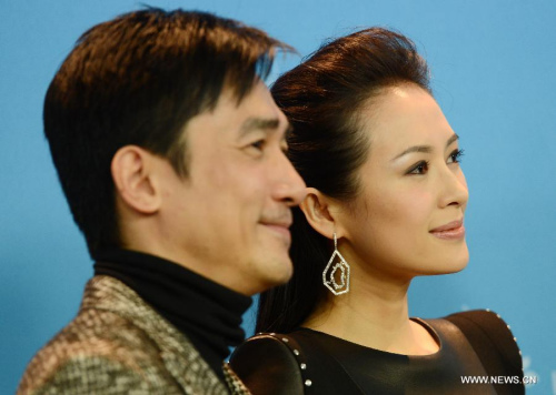 Actor Tony Leung (L) and actress Zhang Ziyi attend the photocall to promote the film The Grandmaster at the 63rd Berlinale film festival in Berlin, Germany, Feb. 7, 2013. The 63rd Berlinale film festival opens Thursday with a martial arts epic The grandmaster of Chinese director Wong Kar Wai who will also lead the jury of this Berlinale. (Xinhua/Ma Ning) 