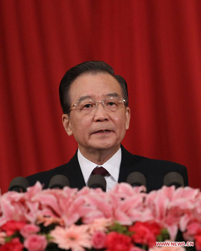 Chinese Premier Wen Jiabao delivers a government work report during the opening meeting of the Fifth Session of the 11th National People's Congress (NPC) at the Great Hall of the People in Beijing, capital of China, March 5, 2012. (Xinhua/Liu Weibing)