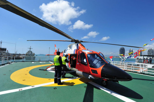 A Chinese maritime helicopter gets ready to take off from Haixun 31, a marine surveillance ship patrolling the South China Sea in this file photo taken in February 28, 2013. [Photo/Xinhua]
