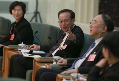 Sun Zhengcai (second from left), Party chief of Chongqing, during a panel discussion of the Chongqing delegation on Wednesday. Feng Yongbin / China Daily