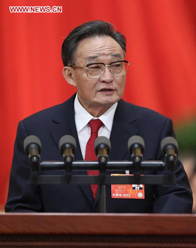 Wu Bangguo delivers a work report of the Standing Committee of the National People's Congress (NPC) during the second plenary meeting of the first session of the 12th NPC at the Great Hall of the People in Beijing, capital of China, March 8, 2013. (Xinhua