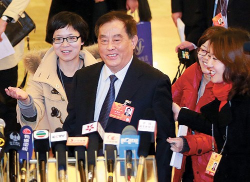 Sheng Guangzu, minister of railways, is the center of media attention on Sunday after a government reshuffle plan proposes to scrap his ministry. [Feng Yongbin / China Daily]