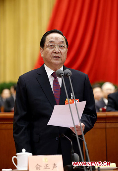 In this file photo taken on March 3, 2013, Yu Zhengsheng presides over the opening meeting of the first session of the 12th National Committee of the Chinese People's Political Consultative Conference (CPPCC) at the Great Hall of the People in Beijing, ca