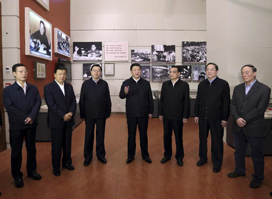 In this file photo taken on Nov. 29, 2012, Xi Jinping (C) views The Road Toward Renewal exhibition at the National Museum of China in Beijing, capital of China. (Xinhua/Lan Hongguang)