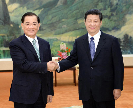 In this file photo taken on Feb. 25, 2013, Xi Jinping (R) meets with Honorary Chairman of the Kuomintang Lien Chan at the Great Hall of the People in Beijing, capital of China. (Xinhua/Li Tao)