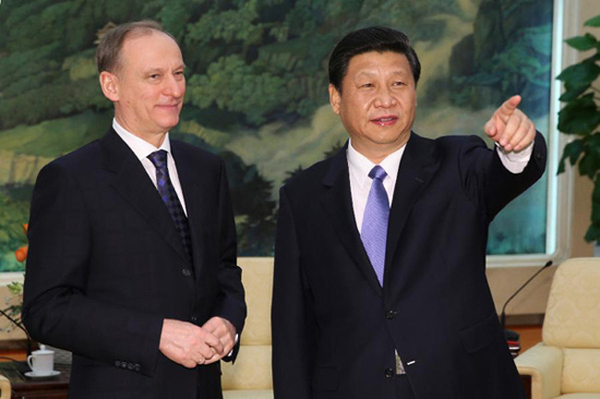 In this file photo taken on Jan. 8, 2013, Xi Jinping (R) meets with Russian Security Council Secretary Nikolai Patrushev at the Great Hall of the People in Beijing, capital of China. (Xinhua/Lan Hongguang)
