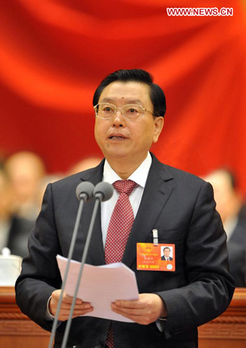In this file photo taken on March 5, 2013, Zhang Dejiang presides over the opening meeting of the first session of the 12th National People's Congress (NPC) at the Great Hall of the People in Beijing, capital of China. (Xinhua/Li Ge)