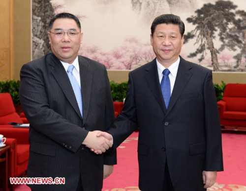 Chinese President Xi Jinping (R) meets with Chui Sai On, chief executive of Macao Special Administrative Region, in Beijing, capital of China, March 18, 2013. (Xinhua/Liu Jiansheng)
