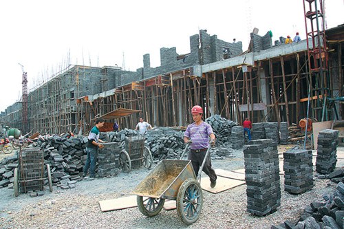 A construction site where government-subsidized housing will be built for villagers in Songtao county, Guizhou province. Huang Qiansheng / for China Daily