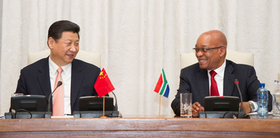 President Xi Jinping meets with his South African counterpart Jacob Zuma in Pretoria on Tuesday. Xi stressed the importance of cooperation with South Africa during the meeting. Huang Jingwen / Xinhua