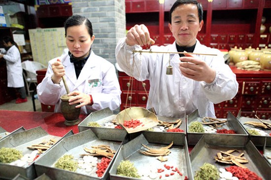 In the balance: Traditional Chinese medicine is facing an awkward situation at home while gaining in popularity abroad. Liu Qinli / For China Daily