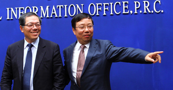 Chen Gang (left), deputy governor of the Guangxi Zhuang autonomous region, and Zhao Leqin, Party chief of Guilin city, at a news conference in Beijing on Tuesday. ZOU HONG / CHINA DAILY