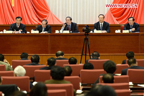 Yu Zhengsheng (C), a member of the Standing Committee of the Political Bureau of the Communist Party of China (CPC) Central Committee, who is also chairman of the National Committee of the Chinese People's Political Consultative Conference (CPPCC), makes a remark at a meeting attended by the heads of all special committees under the CPPCC National Committee, in Beijing, capital of China, March 28, 2013.(Xinhua/Liu Jiansheng)