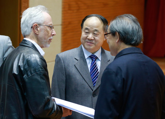 J.M. Coetzee (left), Nobel laureate in literature in 2003, Chinese writer Mo Yan (center) and Chinese translator Li Yao talk on Tuesday at the Second China-Australia Literary Forum held in Beijing. FENG YONGBIN / CHINA DAILY