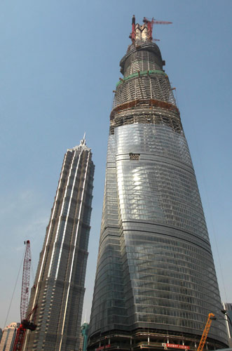 The Shanghai Tower, which is under construction, has reached 501.3 meters, April 11, 2013. [Photo/Xinhua]