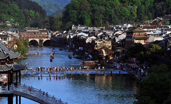 The ancient town of Fenghuang county, Hunan province. Saturday was the first weekend day admission was charged to enter the town. Zhao Zhongzhi / Xinhua