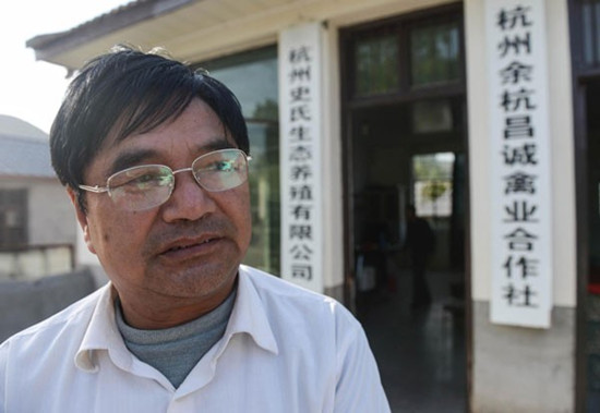 Shi Zhengxiang, 63, who owns a chicken farm in East Chinas Zhejiang province, worries about the impact of the H7N9 bird flu scare on his business, April 15. [Photo/Xinhua]  