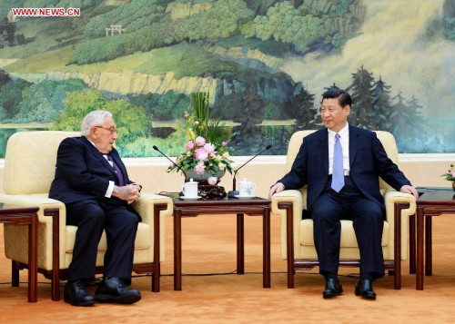 Chinese President Xi Jinping (R) meets with former U.S. Secretary of State Henry Kissinger at the Great Hall of the People in Beijing, capital of China, April 24, 2013. (Xinhua/Li Tao)