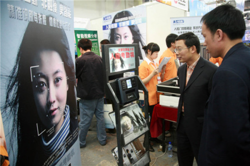 An attendance checking and access machine, based on face recognition technology, being displayed at an exhibition in Shenyang, Liaoning province, on April 23, 2009. Huang Jinkun / for China Daily