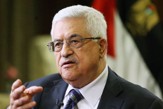 Palestinian President Mahmoud Abbas spoke at a joint news conference at the Diaoyutai State Guesthouse in Beijing on Monday night. Xu Jingxing / China Daily