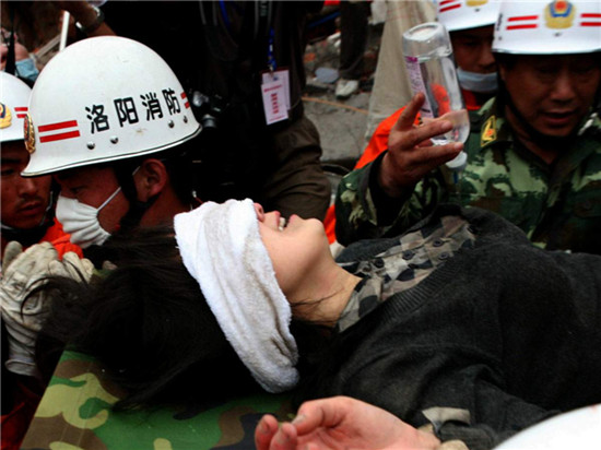 Bian Gangfen was saved from the debris 125 hours after the 2008 Wenchuan earthquake. [Photo by Huo Yan / China Daily]