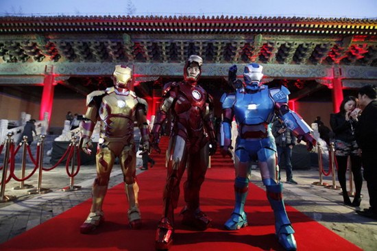 Performers pose for a photo during a promotional event of the movie Iron Man 3 before its release in China at the Imperial Ancestral Temple of Beijing's Forbidden City, in this April 6, 2013 file picture. [Photo/Agencies]