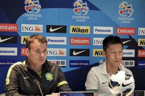 Guo'an Head Coach Aleksandar Stanojevic and Defender Zhu Ting. (Source: Sina Sports)