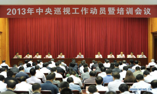 Wang Qishan, secretary of the Communist Party of China (CPC) Central Commission for Discipline Inspection, attends a conference and training session on central-level Party inspection in Beijing, capital of China, May 17, 2013. (Xinhua/Xie Huanchi)