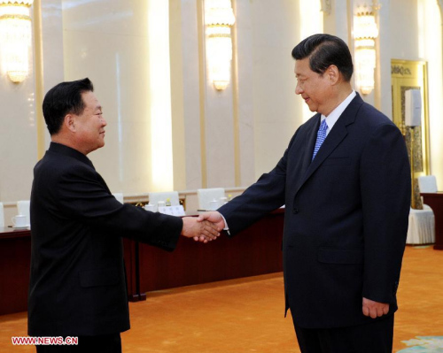 Chinese President Xi Jinping (R) meets with Choe Ryong Hae, the special envoy of Kim Jong Un, leader of the Democratic People's Republic of Korea (DPRK), in Beijing, capital of China, May 24, 2013. Choe, director of the General Political Bureau of the Korean People's Army and a member of the Presidium of the Political Bureau of the Workers' Party of Korea Central Committee, arrived in Beijing Wednesday. (Xinhua/Rao Aimin)