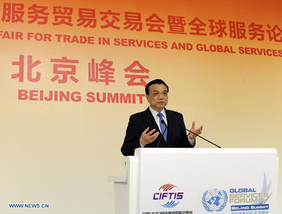 Chinese Premier Li Keqiang delivers a speech at the 2nd China Beijing International Fair for Trade in Services (CIFITIS) and Global Services Forum-Beijing Summit in Beijing, capital of China, May 29, 2013. (Xinhua/Rao Aimin)