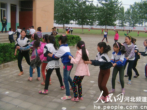 Left-behind children play games in a primary school in Hebei Province. The Supreme People's Court has vowed zero tolerance of crimes that affect the rights of children, highlighting sexual abuse and corporal punishment. 