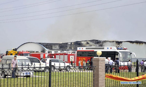 Photo taken on June 3, 2013 shows the accident site after a fire occurred at the Jilin Baoyuanfeng Poultry Company in Mishazi Township of Dehui City, northeast China's Jilin Province. (Xinhua/Wang Haofei)