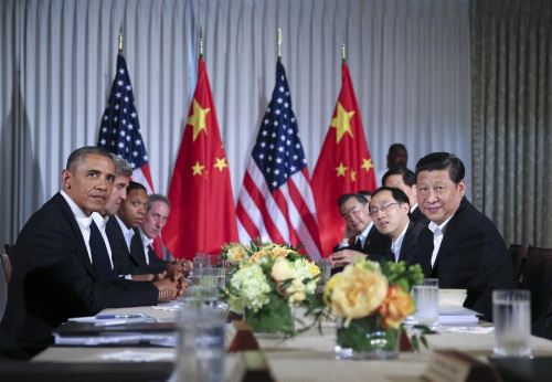 Chinese President Xi Jinping (1st R) meets with U.S. President Barack Obama (1st L) at the Annenberg Retreat, California, the United States, June 7, 2013. Chinese President Xi Jinping and his U.S. counterpart, Barack Obama, met Friday to exchange views on major issues of common concern. (Xinhua/Lan Hongguang)