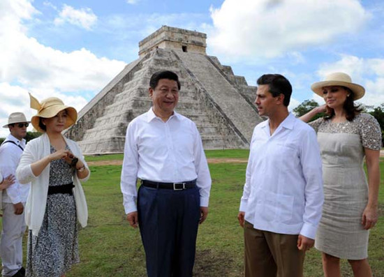 Xi and Pena Nieto with their wives at the Chichen Itza Mayan pyramid in Yucatan state. Rao Aimin / Xinhua 