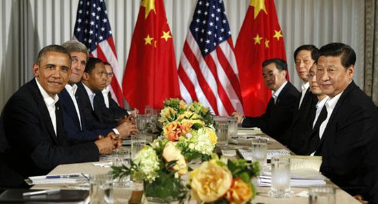 Chinese President Xi Jinping meets with US President Barack Obama at Sunnylands in Rancho Mirage, California, on June 7. Obama said he welcomes the peaceful rise of China and both countries want a cooperative relationship, as he and Xi kicked off two days of meetings. Kevin Lamarque / Reuters