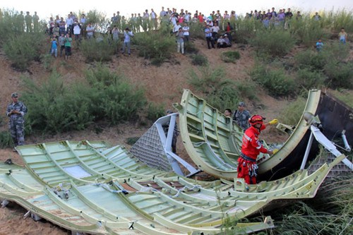 Part of the nose cone of the Shenzhou X spacecraft is found on Tuesday in Yulin, Shaanxi province. Ma Guanghao / For China Daily 