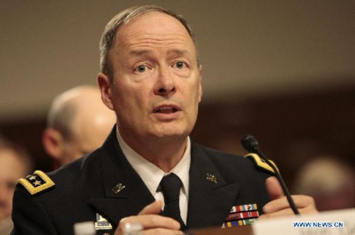 US Army Gen. Keith Alexander, commander of the US Cyber Command, director of National Security Agency (NSA), testifies before a Senate Appropriations Committee hearing in Washington D.C. on June 12, 2013. (Xinhua/Fang Zhe) 