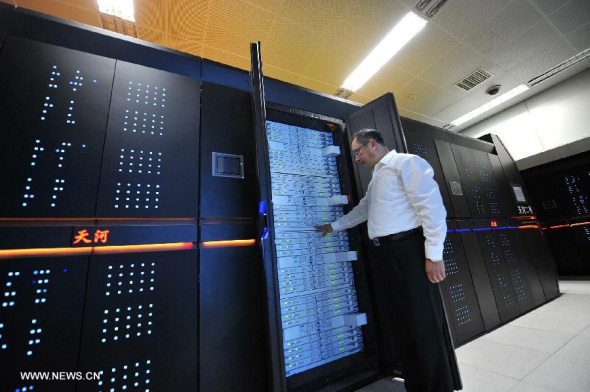 Photo taken on June 16, 2013 shows the supercomputer Tianhe-2 developed by China's National University of Defense Technology. The supercomputer Tianhe-2, capable of operating as fast as 33.86 petaflops per second, was ranked on Monday as the world's fastest computing system, according to TOP500, a project ranking the 500 most powerful computer systems in the world. (Xinhua/Long Hongtao) 