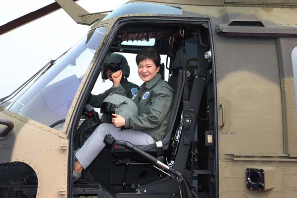 Park poses inside an ROK army Surion helicopter in May, during a ceremony to celebrate its deployment at the Army Aviation School in Nonsan, about 190 km south of Seoul. Ahn Jung-won / Yonhap News Agency via Reuters