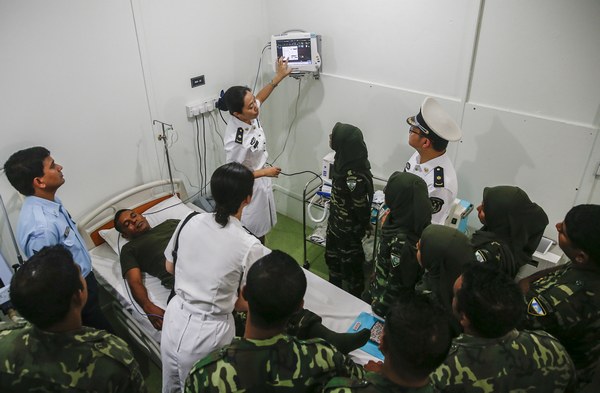 Chinese doctors and nurses during a training session for local medical professionals.