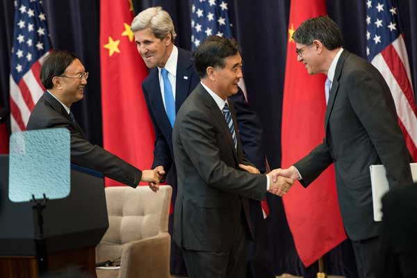 From left: State Councilor Yang Jiechi, US Secretary of State John Kerry, Vice-Premier Wang Yang and US Secretary of the Treasury Jack Lew at the opening of the China-US Strategic and Economic Dialogue in Washington on Wednesday. Brendan Smialowski / Agence France-Presse