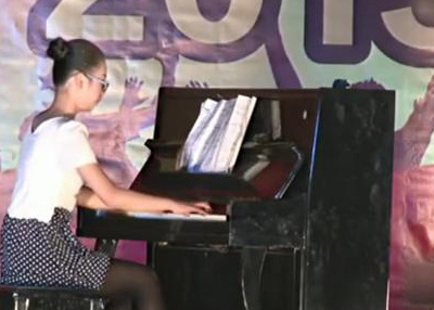 Ye Mengyuan is shown playing piano in this file photo.