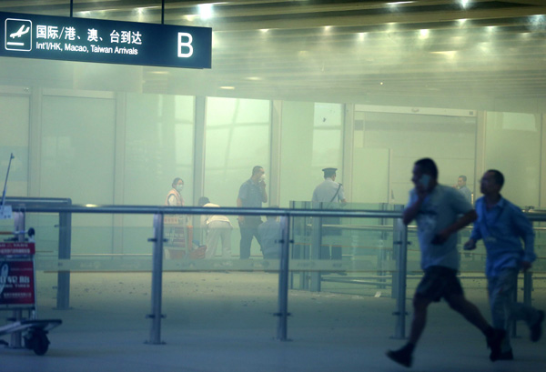 A man in wheelchair detonated an explosive device on Saturday evening in Terminal 3 of Beijing International Airport. Chen Jianli / Xinhua 