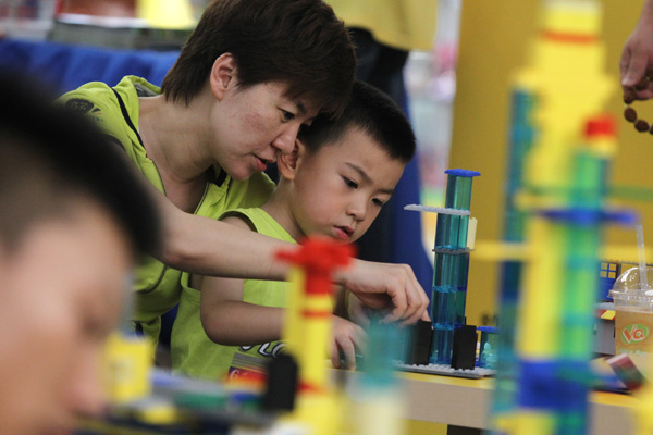 A European Union regulation on toys took full effect on Saturday, setting stricter restrictions on chemical content of toys, putting pressure on Chinese toy makers. Zhu Xingxin / China Daily