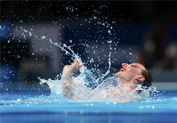 Gold medallist Russia's Svetlana Romashina performs in the synchronized swimming solo free final during the World Swimming Championships at the Sant Jordi arena in Barcelona, July 24, 2013. [Photo/Agencies]