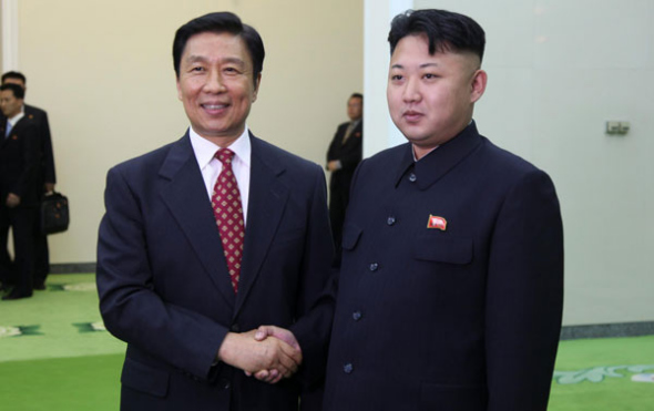 Kim Jong Un, top leader of the Democratic People's Republic of Korea (DPRK), meets in Pyongyang Thursday with visiting Chinese Vice President Li Yuanchao (L) to discuss relations between the two countries.  [Photo/Xinhua]