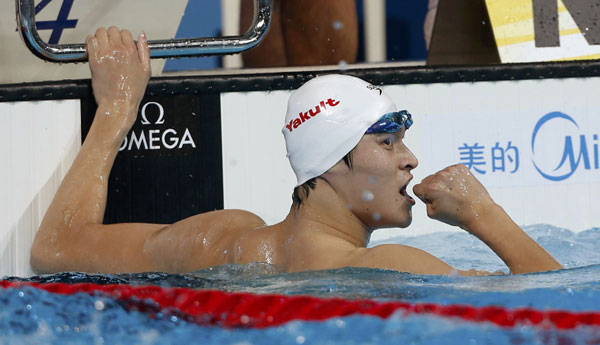 China's Sun Yang reacts after winning the men's 400m freestyle final during the World Swimming Championships at the Sant Jordi arena in Barcelona July 28, 2013.   [Photo/Agencies]