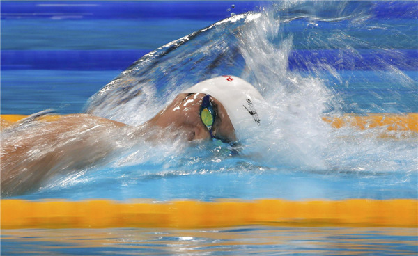 China's Sun Yang swims to win the men's 800m freestyle final during the World Swimming Championships at the Sant Jordi arena in Barcelona, July 31, 2013. [Photo/Agencies]